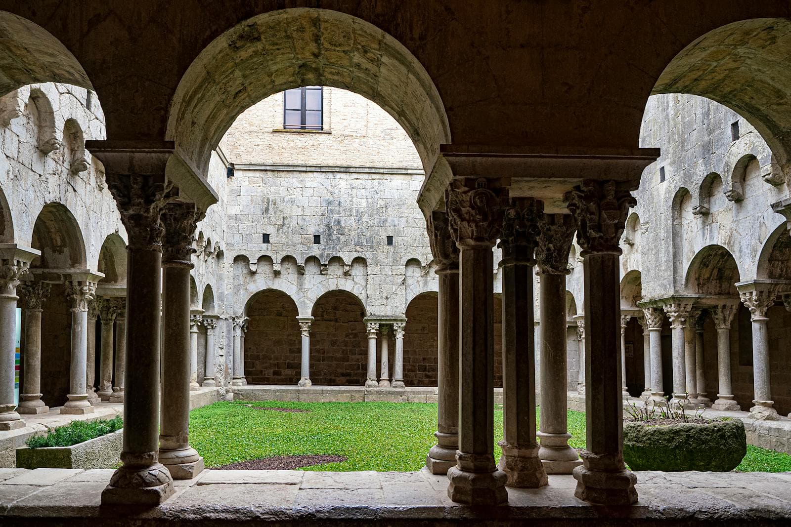 A restored monastery cloister in Spain used as a corporate retreat venue by Odisea Tours