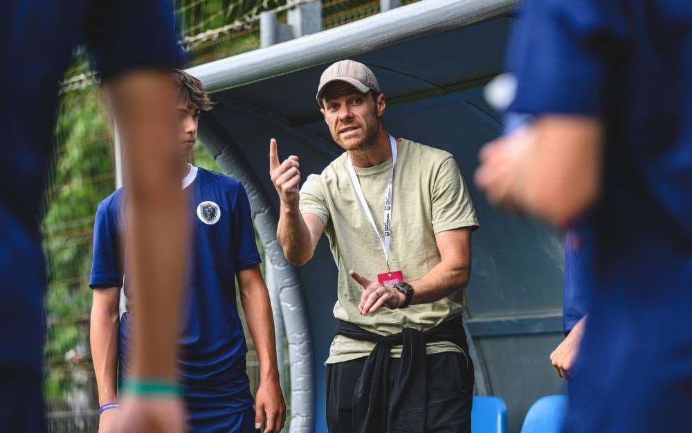 Coaches and players at the Donosti Cup on an Odisea Tours tournament tour