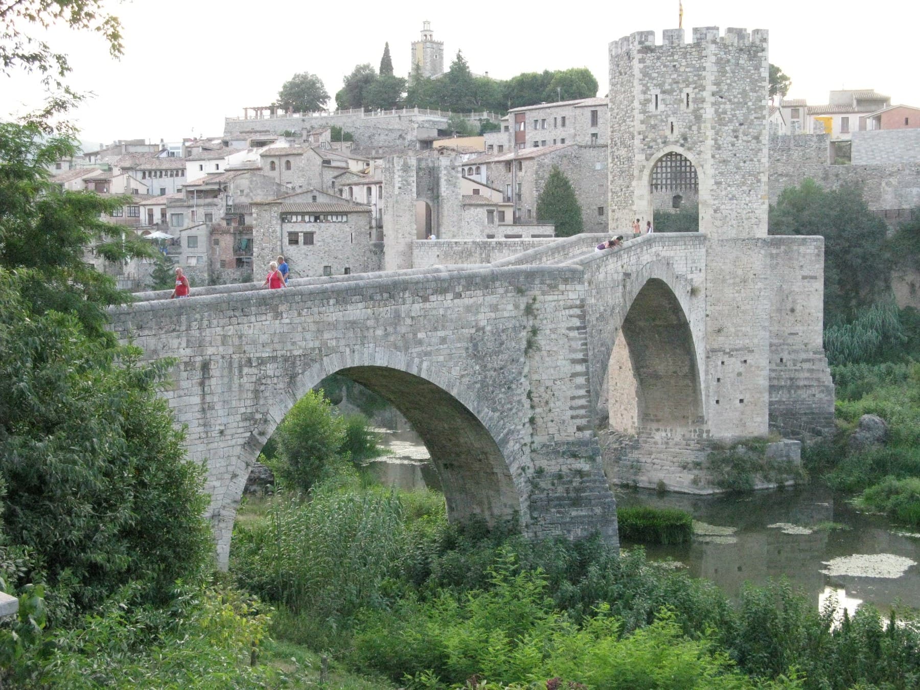 The fortified Romanesque bridge at Besalú and the medieval town behind it